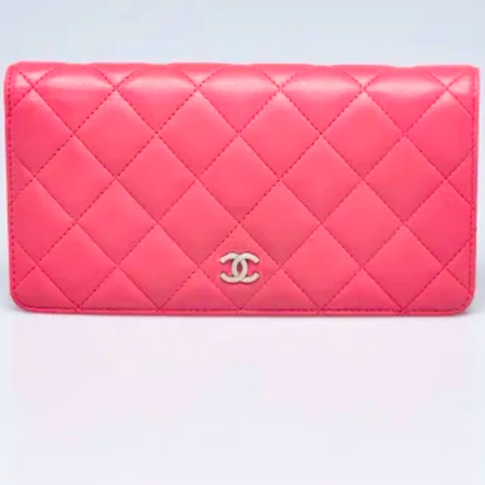 CHANEL
Pink Quilted Lambskin Leather L Yen Wallet